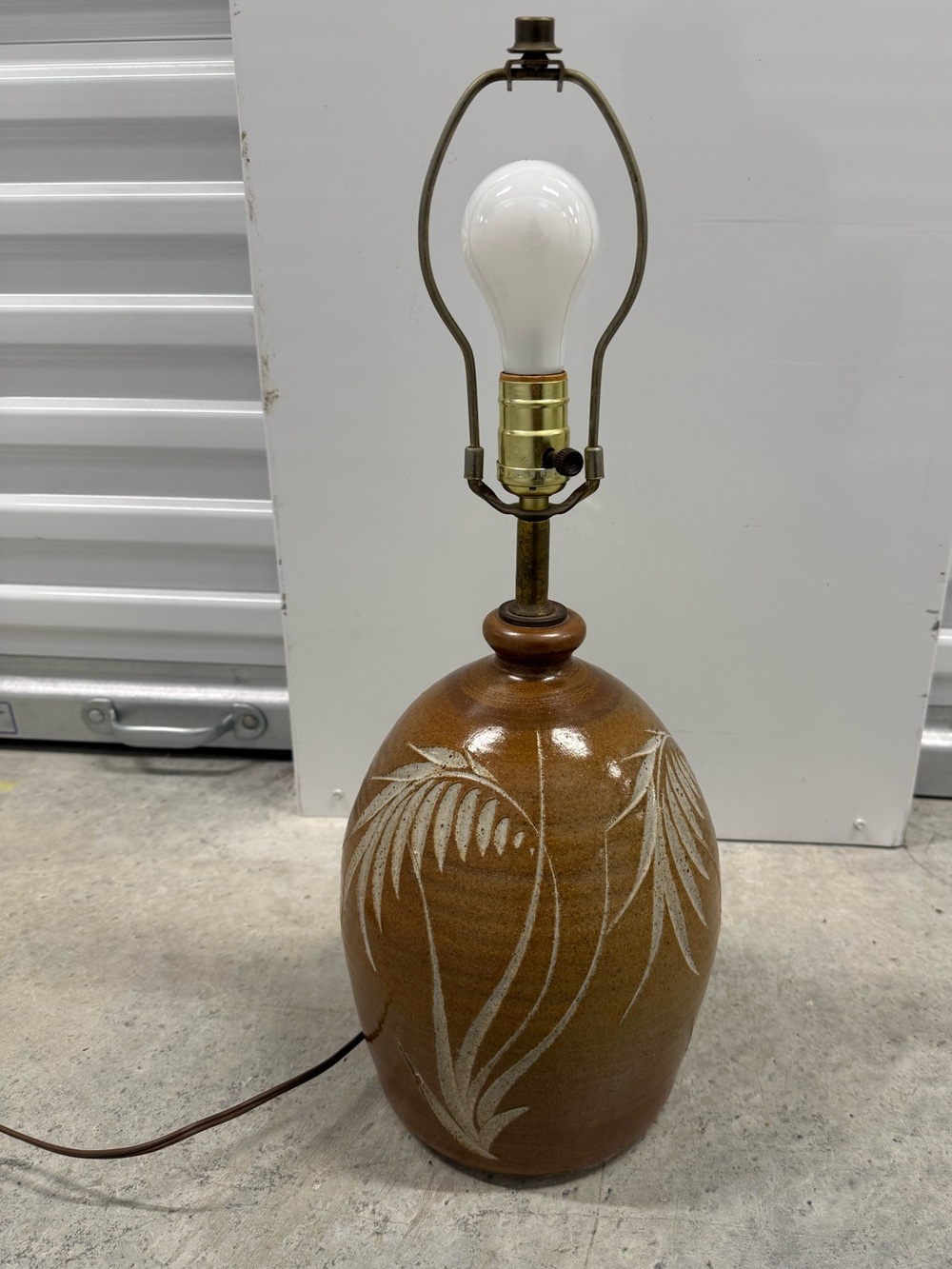 Handcrafted Brown Ceramic Table Lamp with Palm Leaf Motif